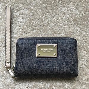 Used MK wristlet
